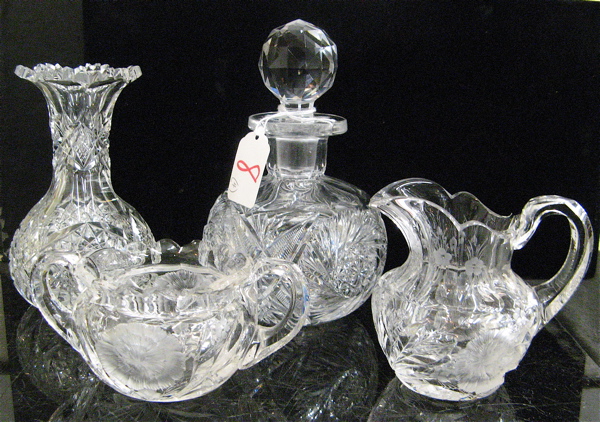 Appraisal: FOUR AMERICAN CUT CRYSTAL TABLE ACCESSORIES One is an oil