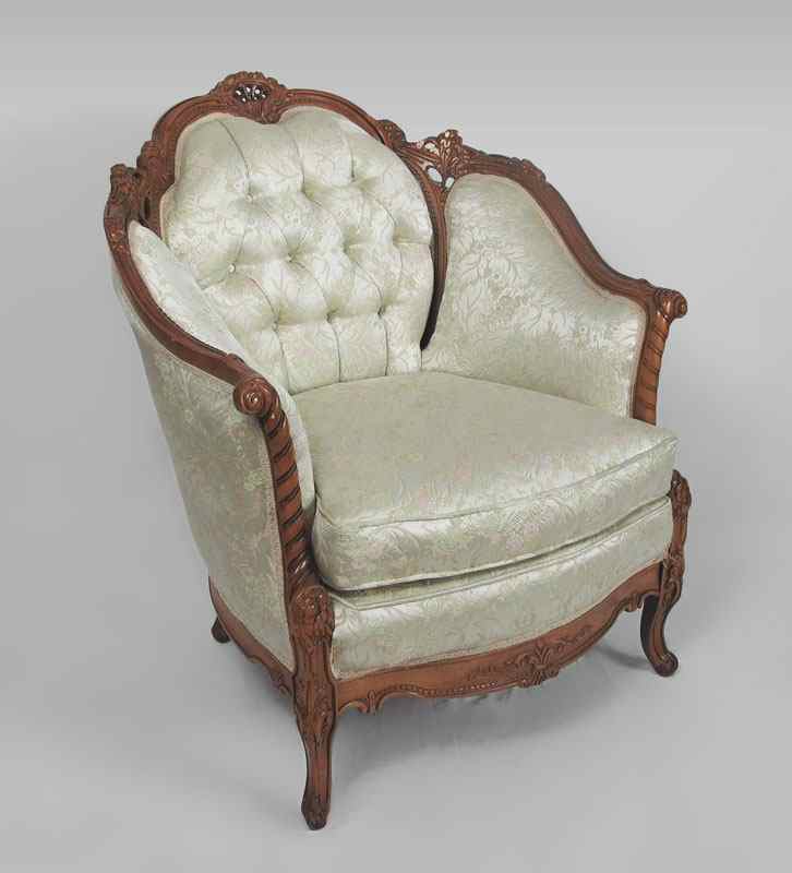 Appraisal: DEUTCH BROTHERS HEAVILY CARVED BARREL BACK CHAIR Profusely carved all