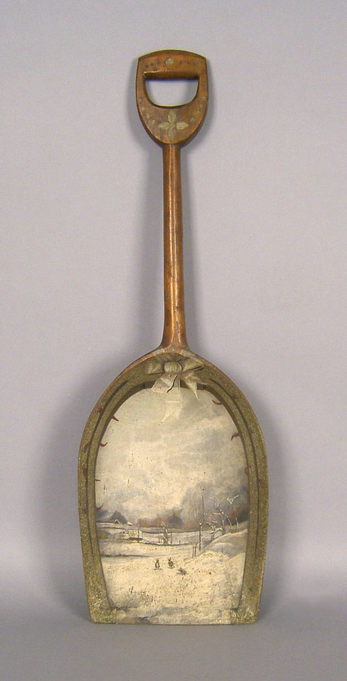 Appraisal: Wood grain shovel th c with a painted winter landscape