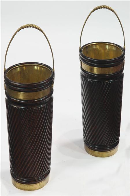 Appraisal: A pair of Georgian style mahogany and brass bound peat