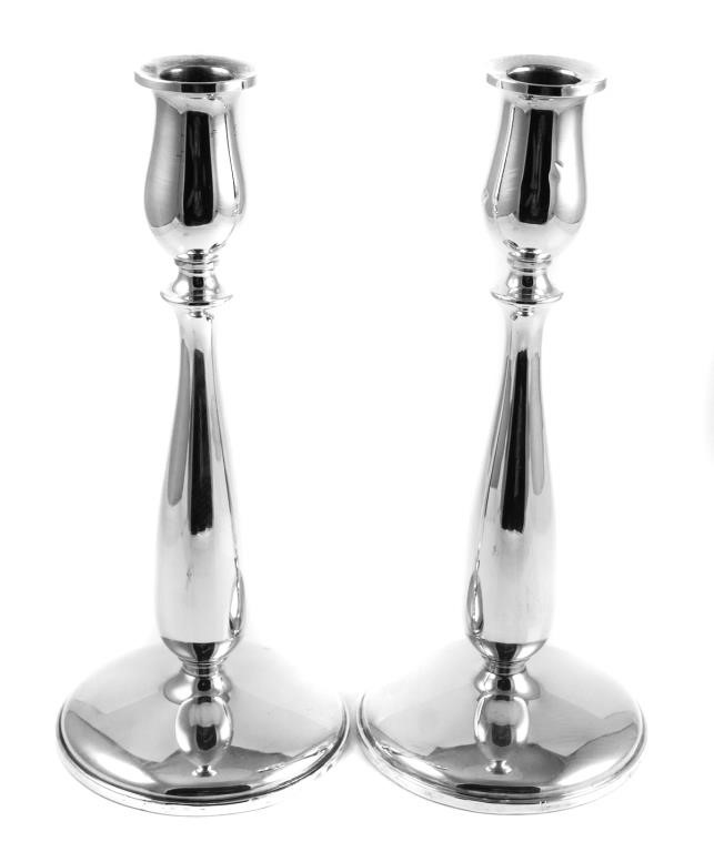 Appraisal: Weighted sterling silver candle stick holders by Cartier Each measures