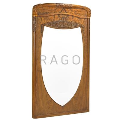 Appraisal: ART NOUVEAU TRUMEAU MIRROR Walnut frame with carved foliate decoration