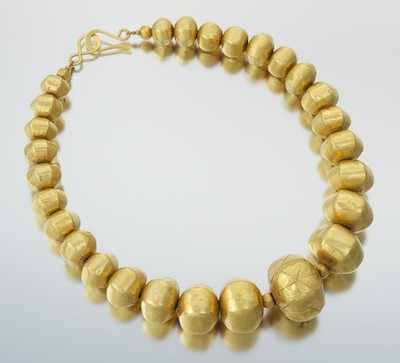 Appraisal: Indian Gold Clad Bead Necklace k gold clad wax beads