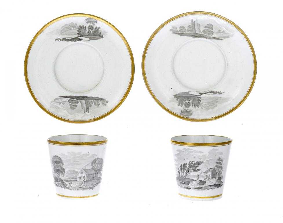 Appraisal: A PAIR OF SPODE CHOCOLATE CUPS AND STANDS the cups