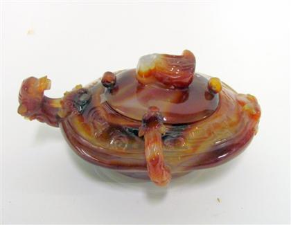 Appraisal: Chinese agate lampOval The lid with a central sea creature