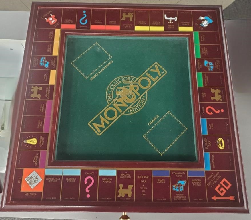 Appraisal: Monopoly game Collectors edition wooden game board with felt covered