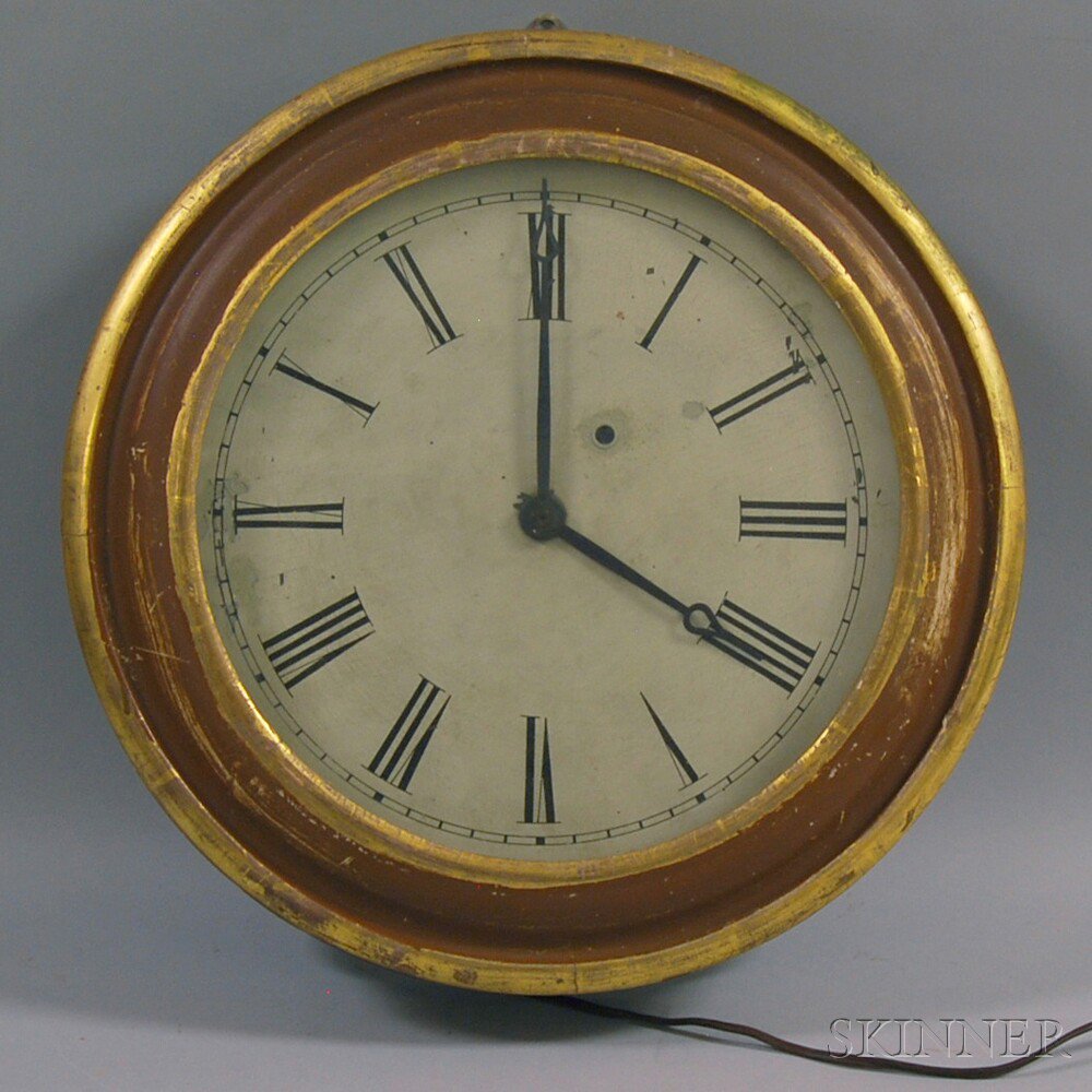 Appraisal: Cased Circular Wall Clock th century the brown-painted case with