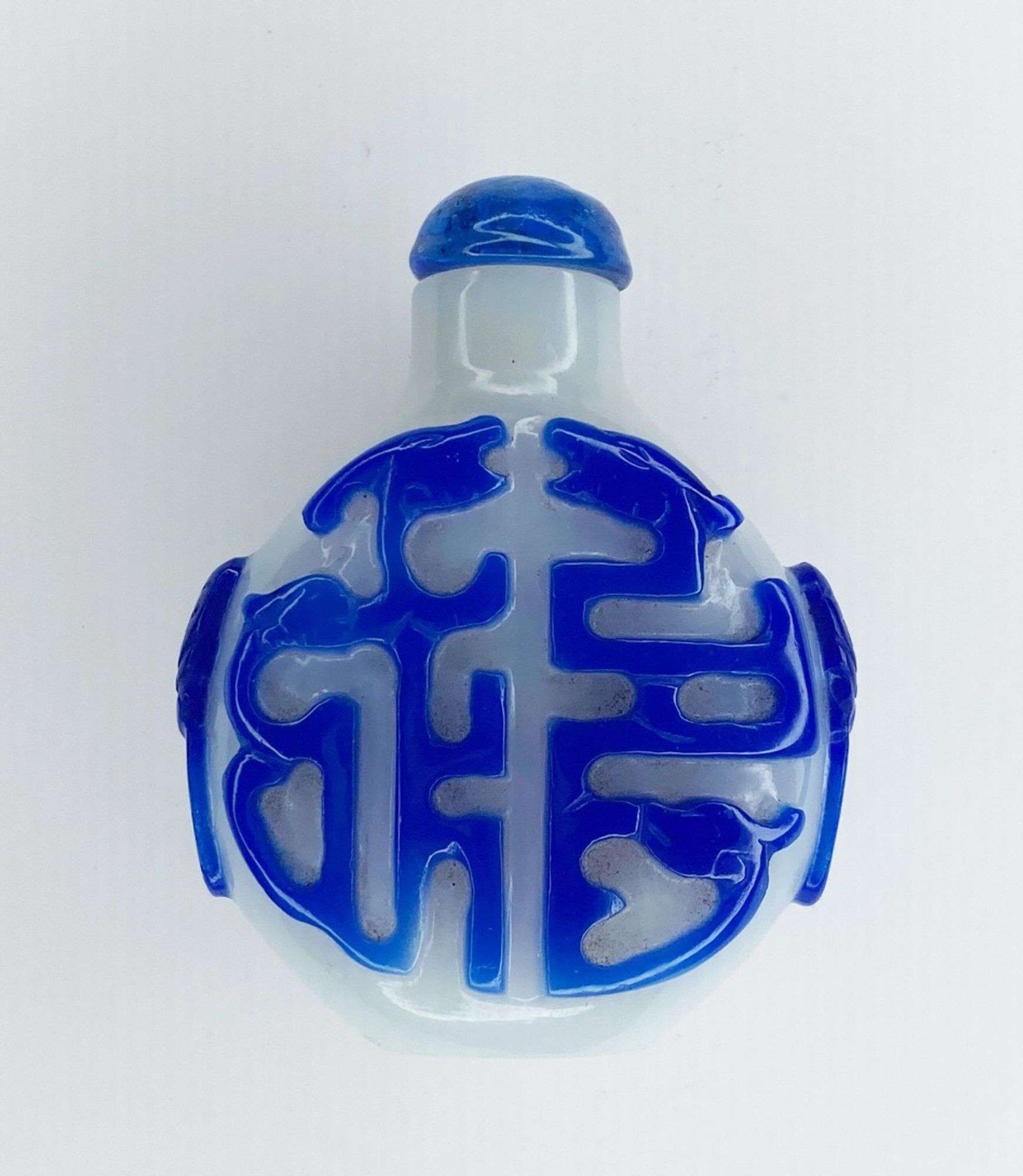 Appraisal: Chinese Carved Peking Glass Snuff Bottle tall at widest Condition