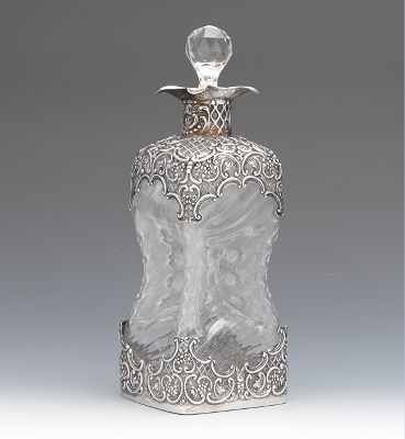 Appraisal: Sterling Silver Overlay Glass Decanter Pinched form clear wrythen glass