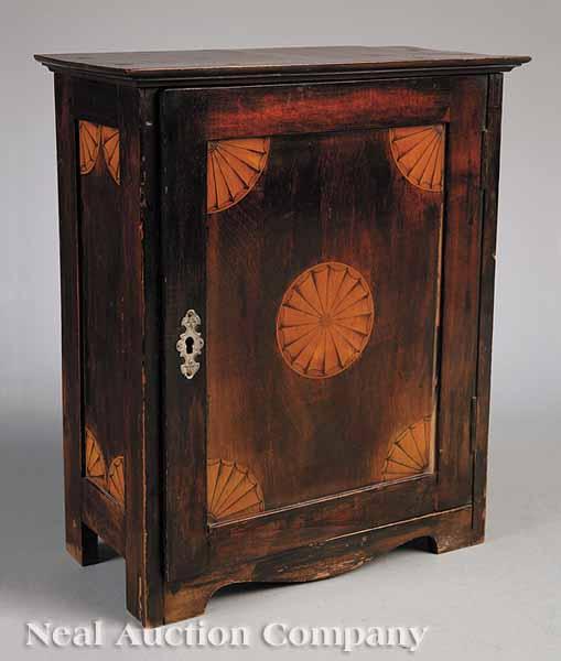 Appraisal: An American Stained Poplar Miniature Armoire early th c with