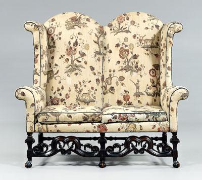 Appraisal: William and Mary upholstered settee high double-arch back scrolled wings