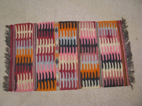 Appraisal: Turkish hand knotted wool carpet with colors of pink orange