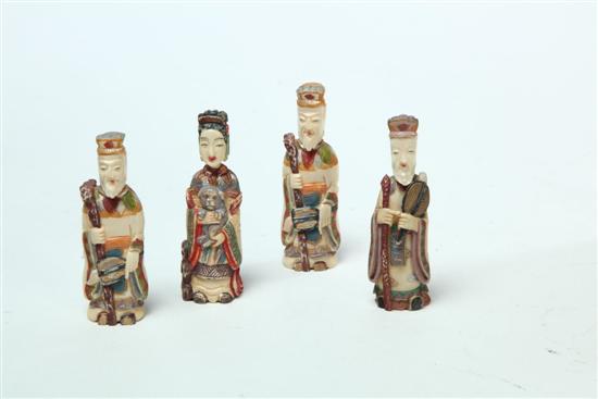 Appraisal: FOUR IVORY FIGURAL SNUFFS China early th century Three men