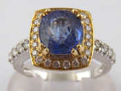 Appraisal: A white metal tests carat gold tanzanite and diamond ring