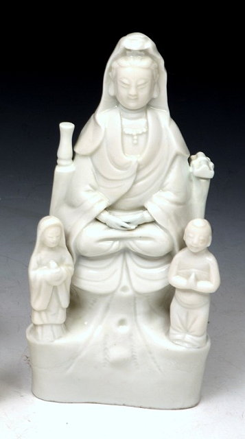 Appraisal: A CHINESE BLANC DE CHINE MODEL OF A SEATED GUANYIN