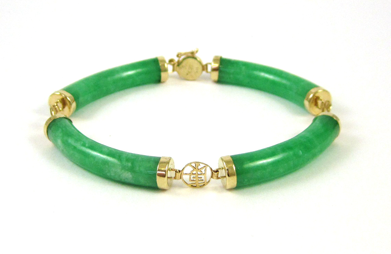 Appraisal: JADE AND FOURTEEN KARAT GOLD BRACELET measuring - inches in