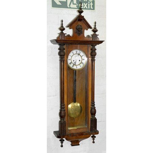 Appraisal: A walnut Vienna clock early th c pendulum and two