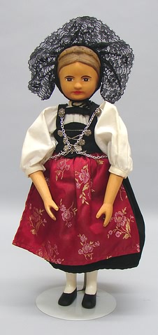 Appraisal: Swiss Linden wood lady doll All wood with hand-carved braided