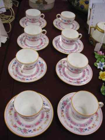 Appraisal: Royal Doulton Porcelain Cups Saucers floral design E- demitasse size