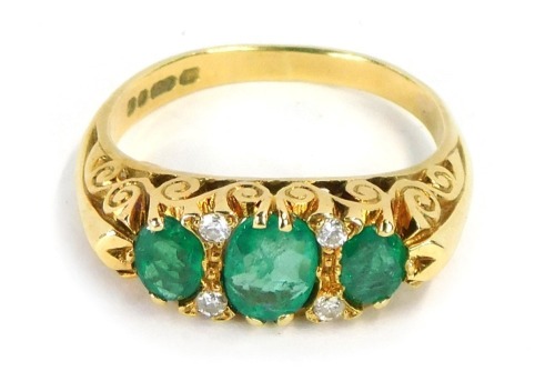 Appraisal: An ct gold emerald and diamond gypsy ring set with