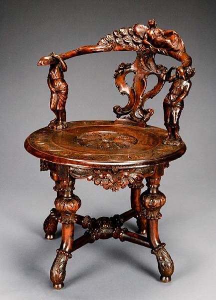 Appraisal: An Austrian Rococo style walnut revolving desk chair late th