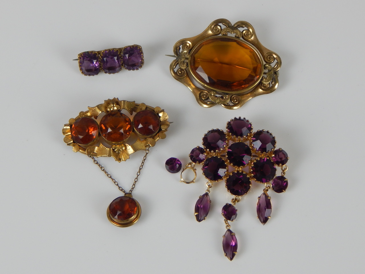 Appraisal: Four brooches to include two Victorian stone set gilt metal