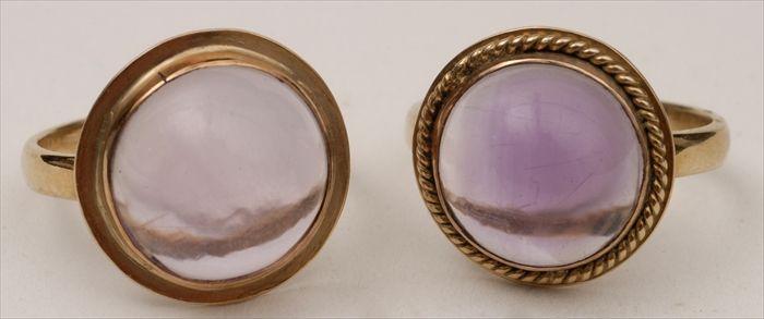 Appraisal: TWO PURPLE CABOCHON AND GOLD RINGS Approx size Provenance Property