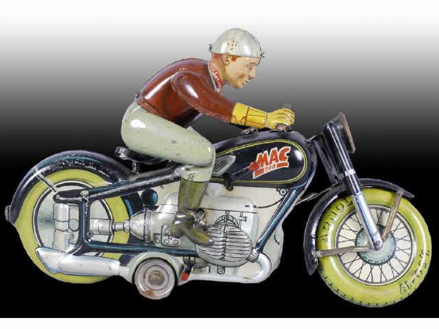 Appraisal: German Arnold Mac Motorcycle Toy Description Tin Wind-up Original headlight