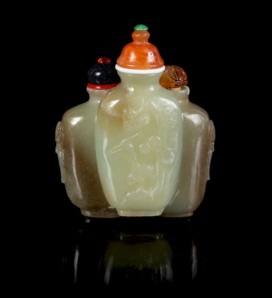 Appraisal: A Chinese Carved Celadon and Grey Jade Snuff Bottle Height