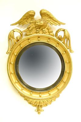 Appraisal: A th century giltwood and gesso convex mirror the eagle