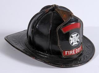 Appraisal: Leather fireman's helmet with a replaced medallion on front fine