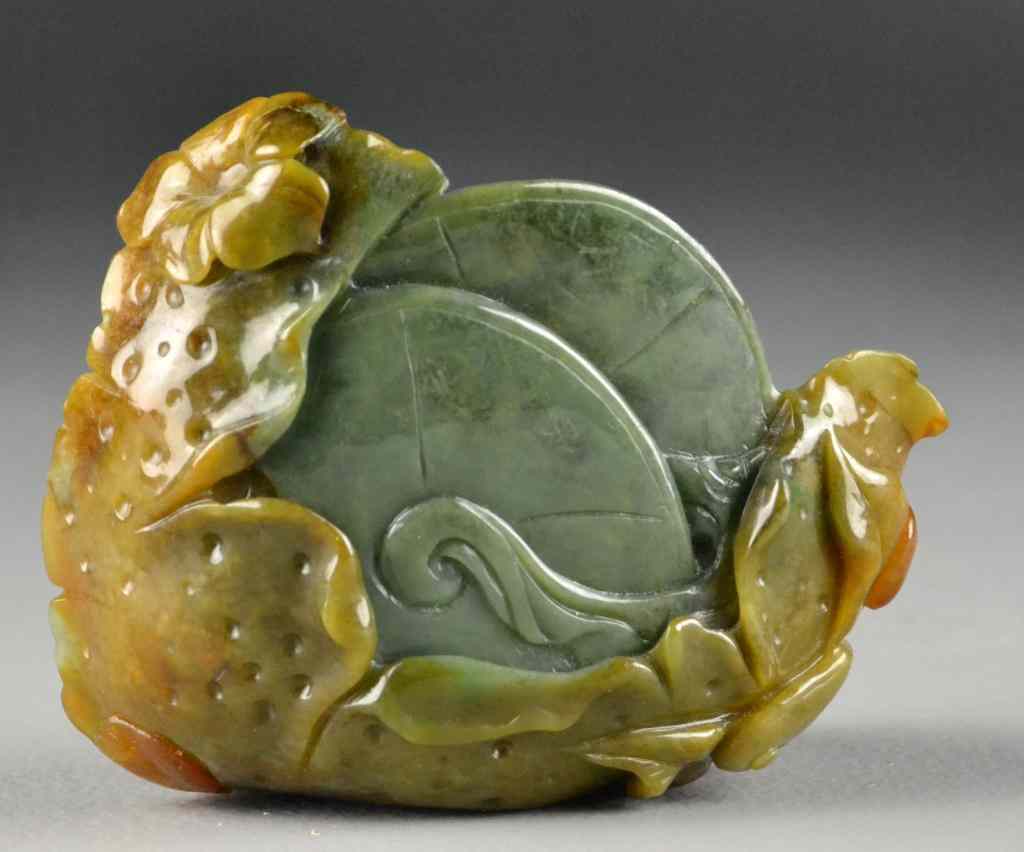 Appraisal: Chinese Jade Sculpture of PomegranatesFinely carved and polished celedon jade