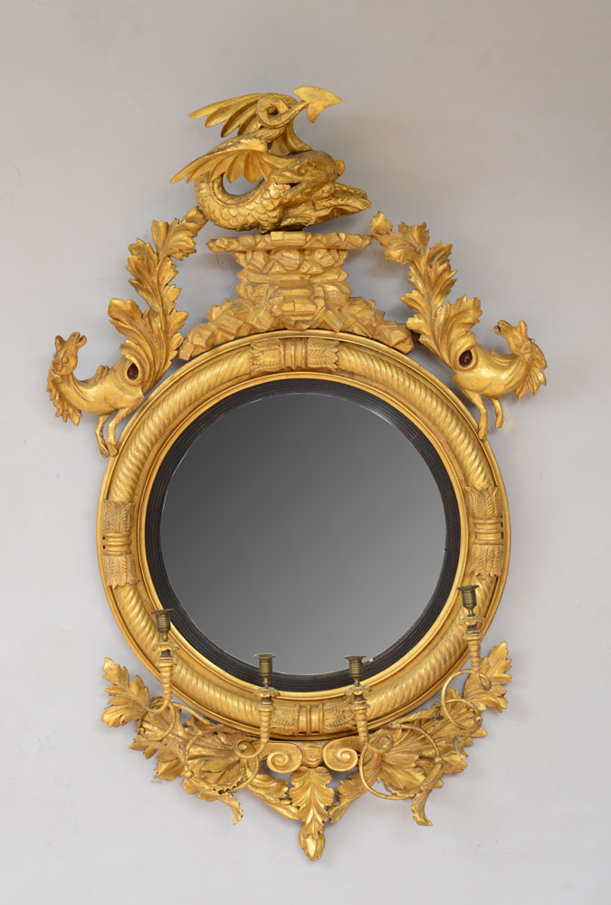 Appraisal: FINE REGENCY GILTWOOD CONVEX GIRANDOLE MIRROR Fitted with four foliate