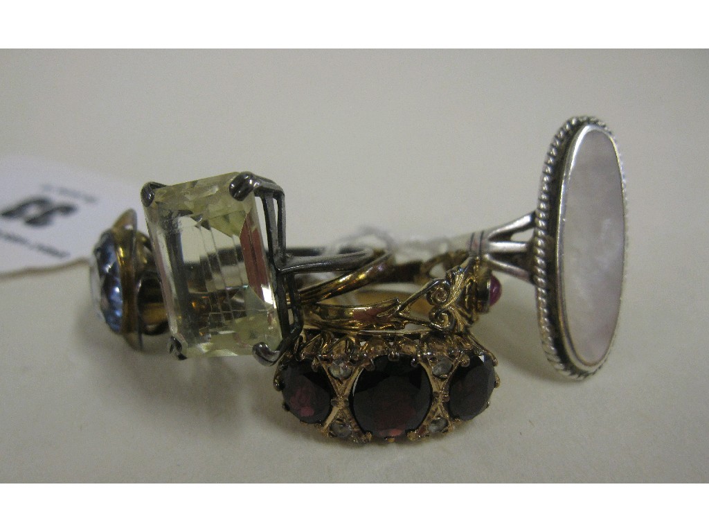 Appraisal: Lot comprising six various dress rings to include garnet three