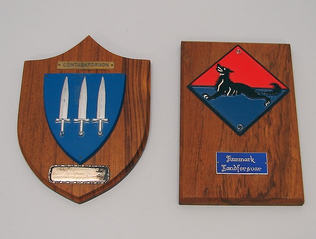 Appraisal: Pair of metal on wood military plaques Plaque For COMTASKFORNON