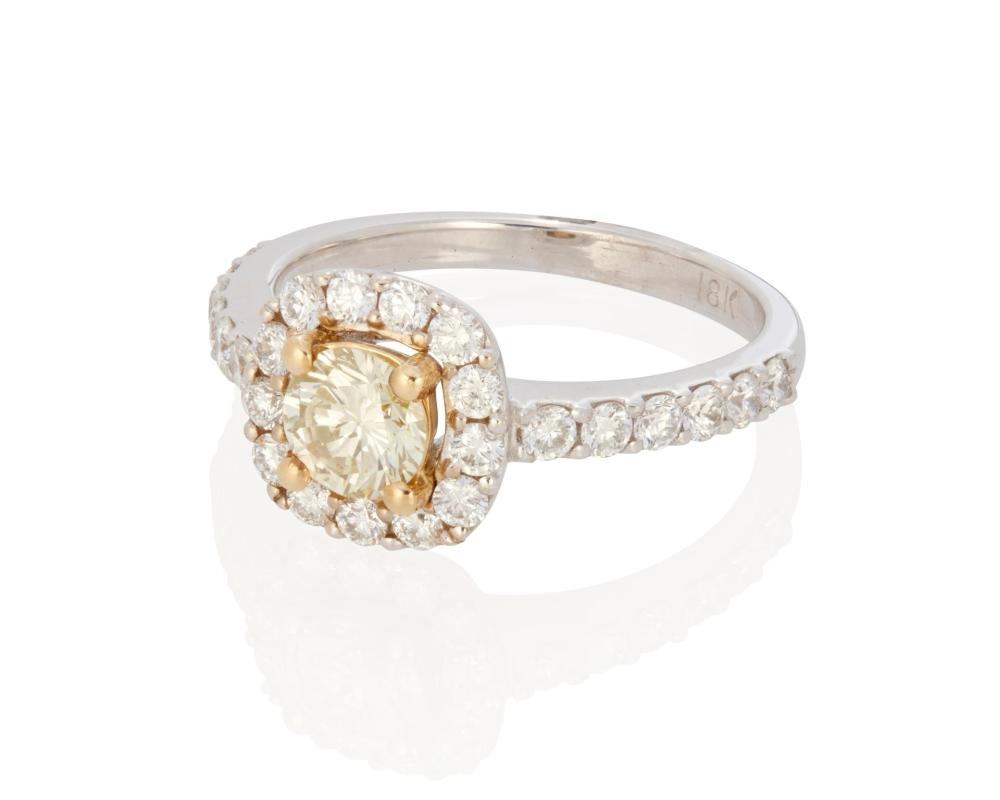 Appraisal: AN IRRADIATED YELLOW DIAMOND RINGAn irradiated yellow diamond ring k