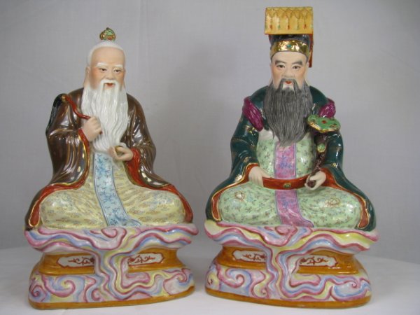 Appraisal: Two Chinese hand painted porcelain statues of Immortal's Tallest measures