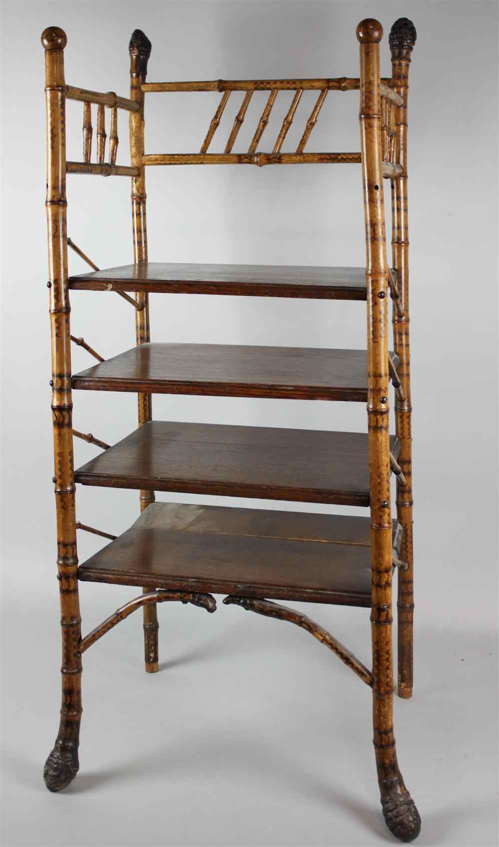 Appraisal: VICTORIAN AESTHETIC BAMBOO BOOK STAND having paint decorated bamboo rails