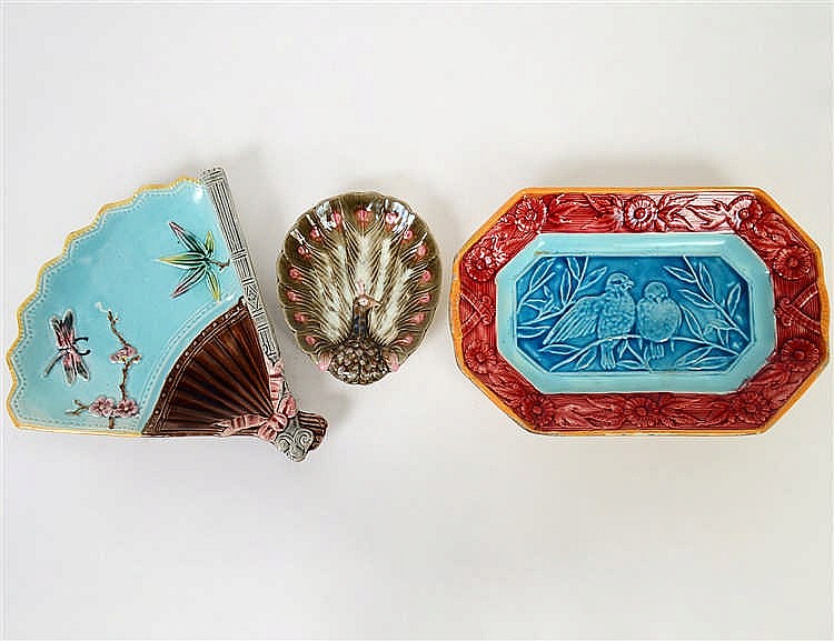 Appraisal: MAJOLICA FAN SERVING PLATE AND PEACOCK DISHEnglish or French Early