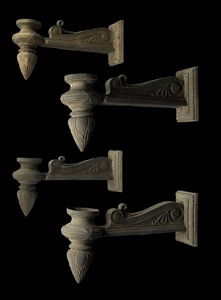 Appraisal: A set of four Baroque style patinated bronze wall lights