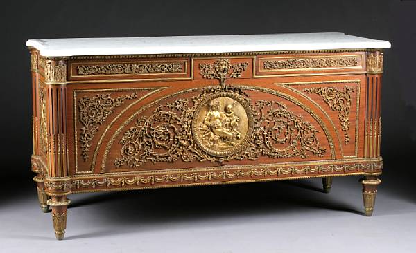 Appraisal: A Louis XVI style gilt bronze mounted mahogany commode first