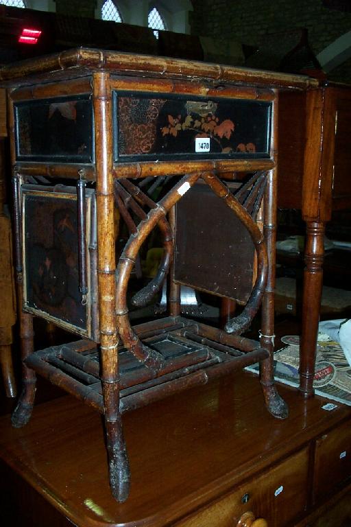 Appraisal: A th century bamboo and lacquered work table with rising