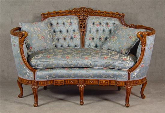 Appraisal: Rococo Style Kidney Shaped Loveseat Circa Extensively carved walnut with