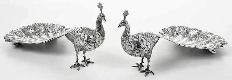 Appraisal: Pair Silver Pheacocks probably Continental th century figural large footed