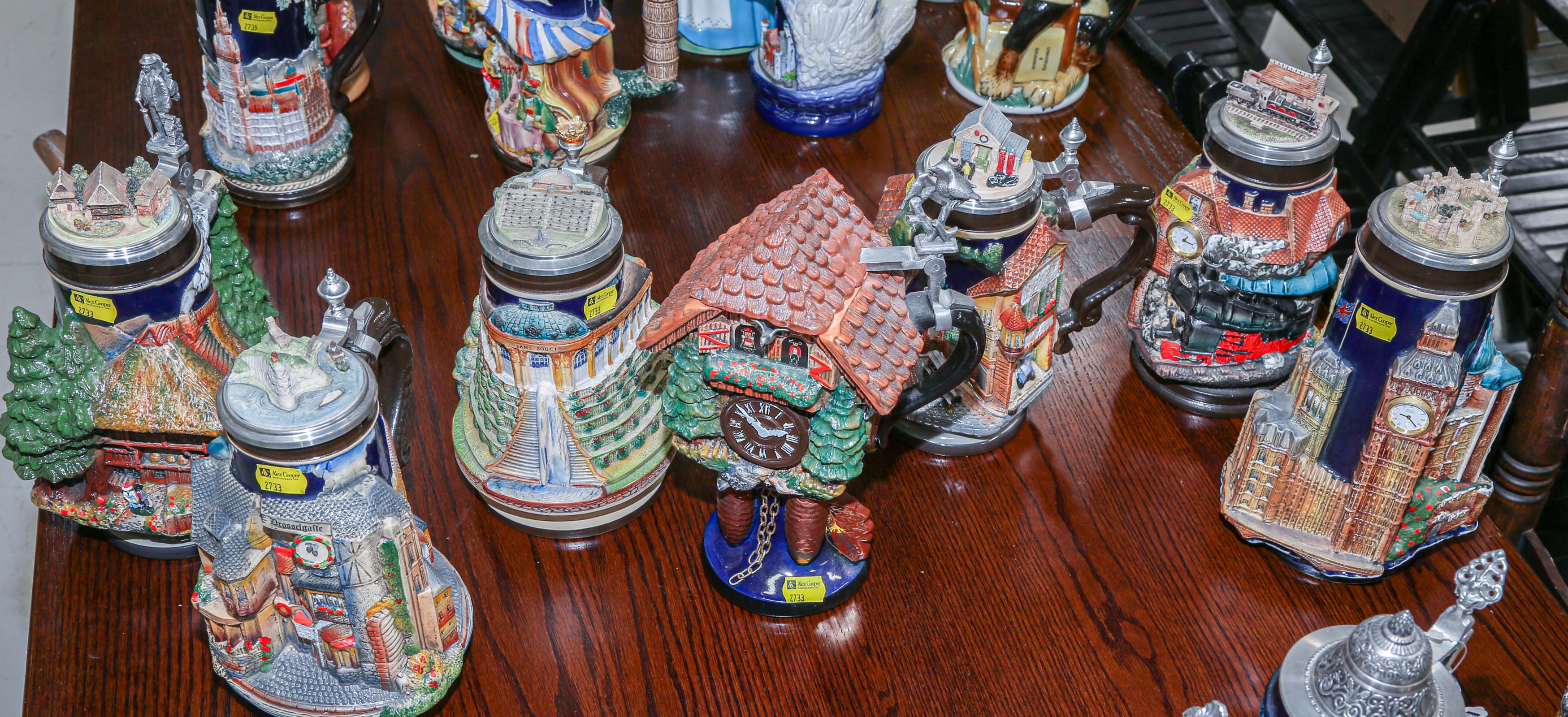 Appraisal: SELECTION OF GERMAN BEER STEINS Most pertaining to famous building