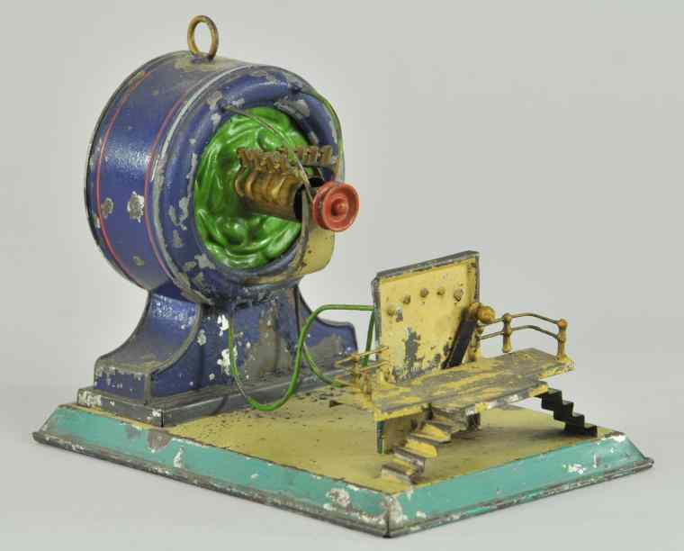 Appraisal: CLOCKWORK DYNAMO Hand painted early tin example done in blue