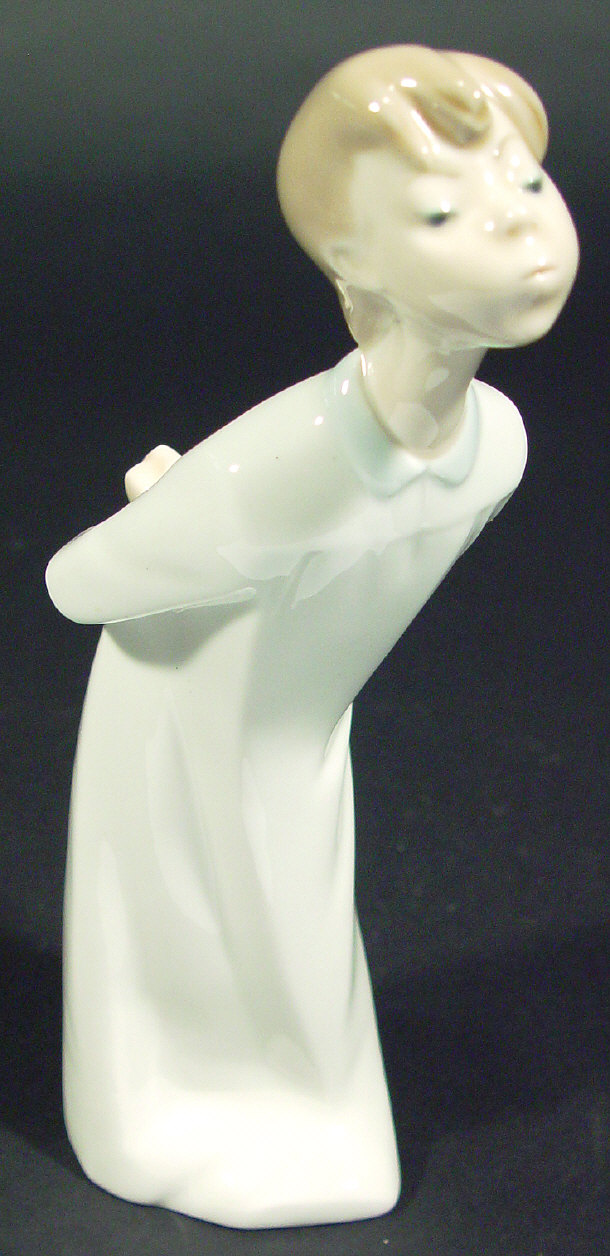 Appraisal: Lladro porcelain figure 'Boy Glowing' printed factory mark to the