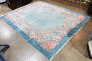 Appraisal: Chinese blue teal rug with floral ground circa ' x