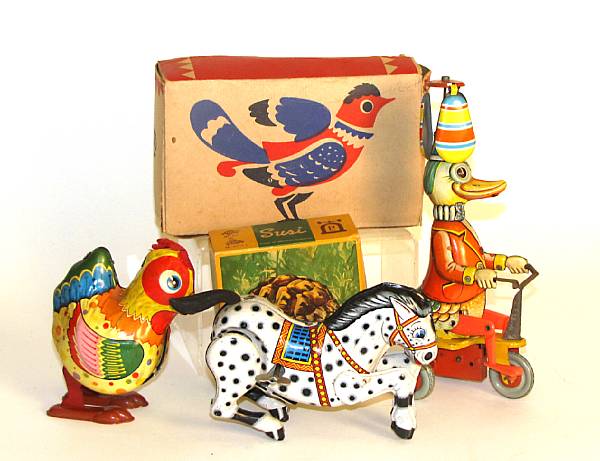 Appraisal: Accumulation of lithographed toy animals Lot features clockwork litho'd toy