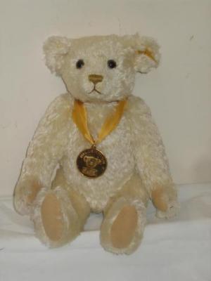 Appraisal: A Steiff Millenium Bear made for Danbury Mint with cream